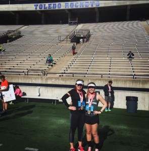 Amanda and her mother after finishing a half-marathon together in 2015.